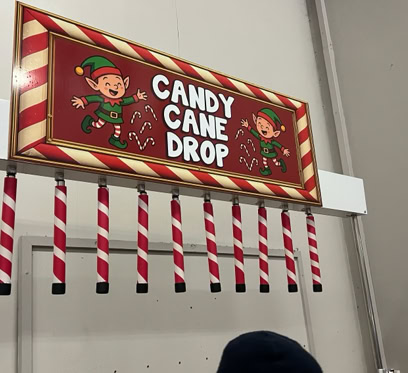 Candy cane drop, Christmas quick reaction carnival game hire northern ireland