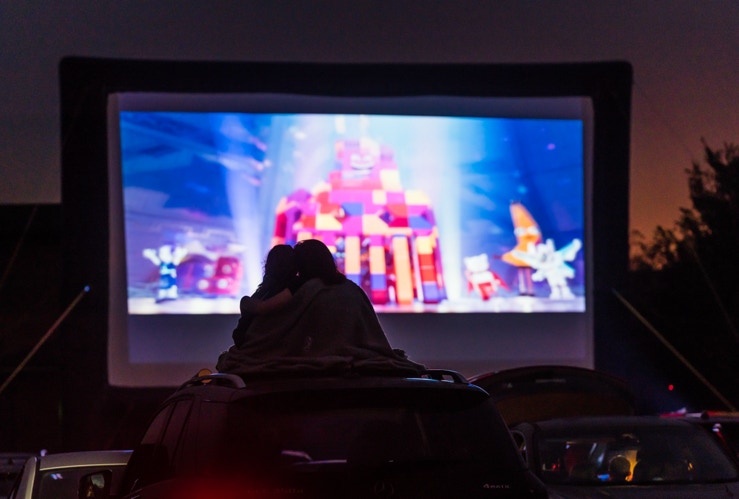 Cuddle up at a drive in movie with our large 40ft cinema screen for hire